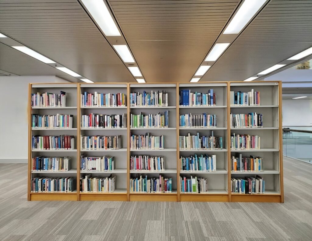 a row of bookshelves filled with lots of books